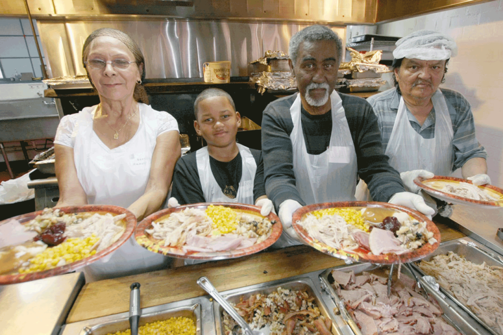 Salvation Army volunteers serving Thanksgiving dinner