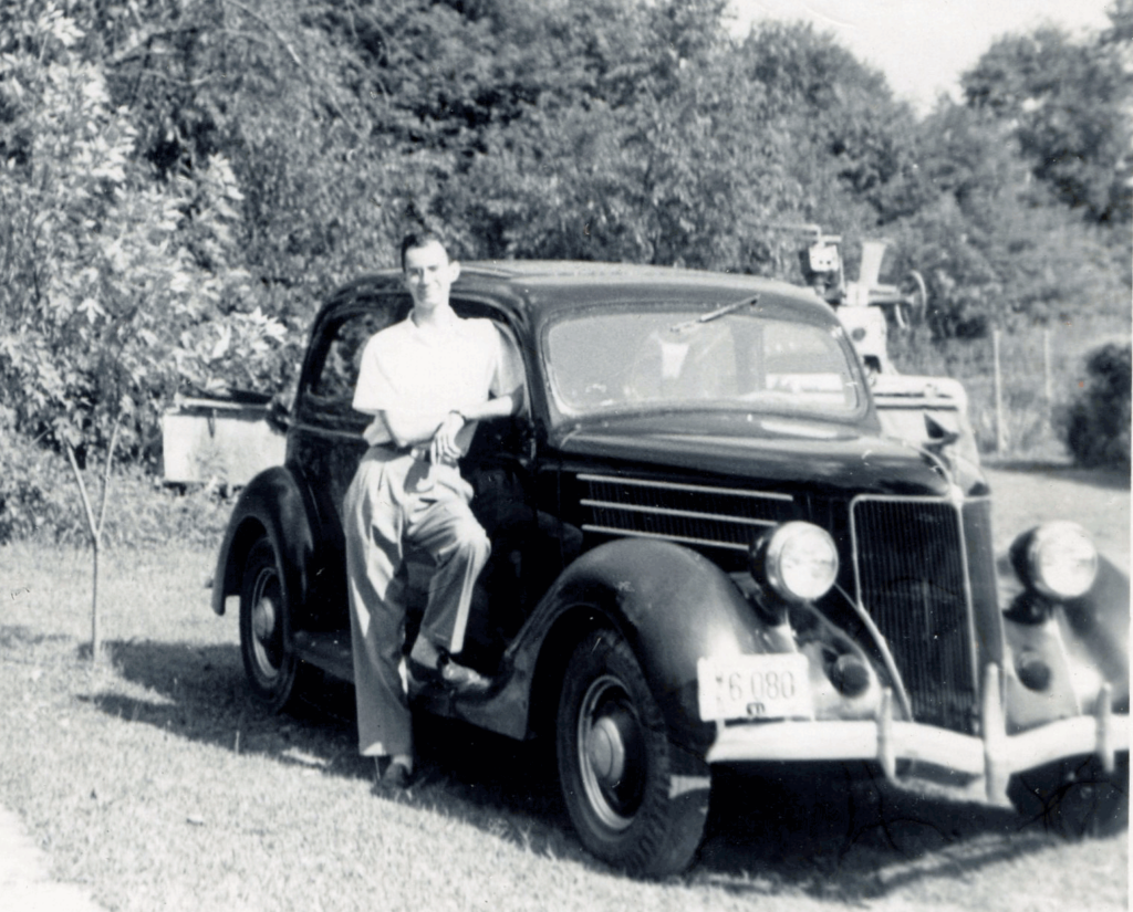 Dad and his 1935 Chevy coupe