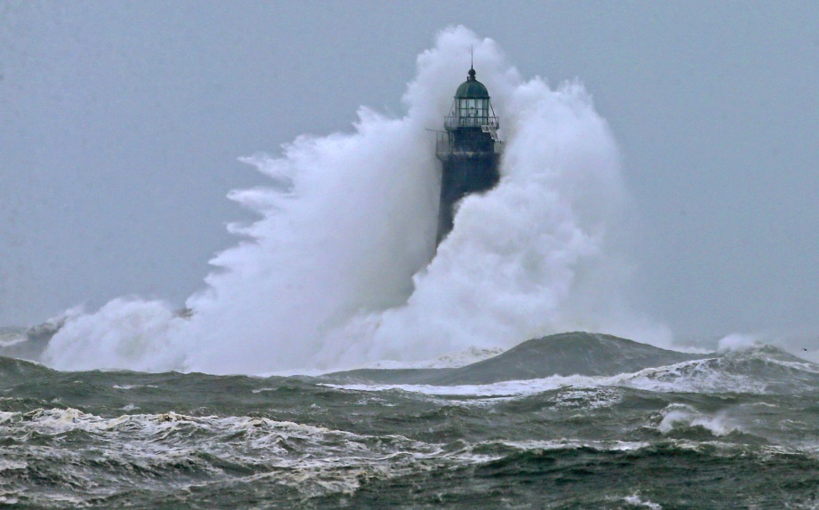 Storm against lighthouse. Matt Stone, Boston Herald